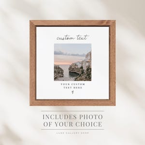 May include: A framed print with a scenic coastal photograph. The frame is a warm brown color. The print includes the words "custom text", "YOUR CUSTOM TEXT HERE", and "INCLUDES PHOTO OF YOUR CHOICE". The shop name "LUNE GALLERY SHOP" is also visible.