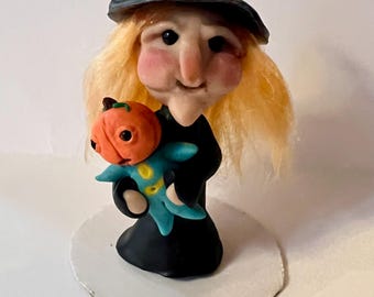 witch and baby pumpkin