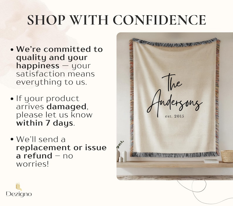 May include: A cream-colored woven throw blanket with black fringe and the text "The Andersons est. 2015" in a script font. The blanket is displayed on a wooden shelf. The image also includes the text "SHOP WITH CONFIDENCE".