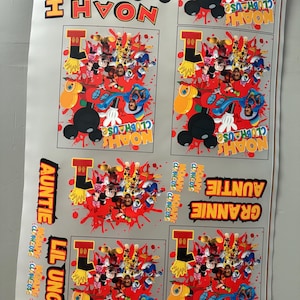 May include: A sheet of printed designs featuring Mickey Mouse and friends. The designs include the name "Noah" and the phrase "Noah's Clubhouse" in various arrangements. Other text includes "Auntie", "Grannie", "Lil Ung", and "Big".