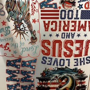 May include: A patriotic design featuring the Statue of Liberty, a raccoon with a hot dog, and a fish leaping from water. The design incorporates the American flag, stars, and text that reads "MAMA", "SHE LOVES JESUS AND AMERICA TOO".