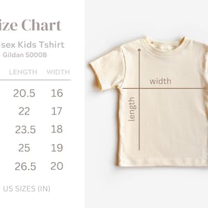 May include: Cream-colored Unisex Kids T-shirt with size chart. The chart shows measurements in inches for sizes XS to XL. The shirt's length and width are indicated with arrows. The text "US SIZES (IN)" is at the bottom.