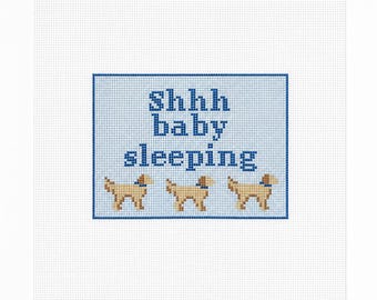 borduurbord gouden retriever baby slaapt