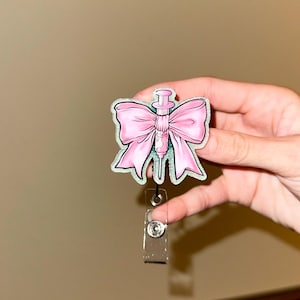 bow badge reel