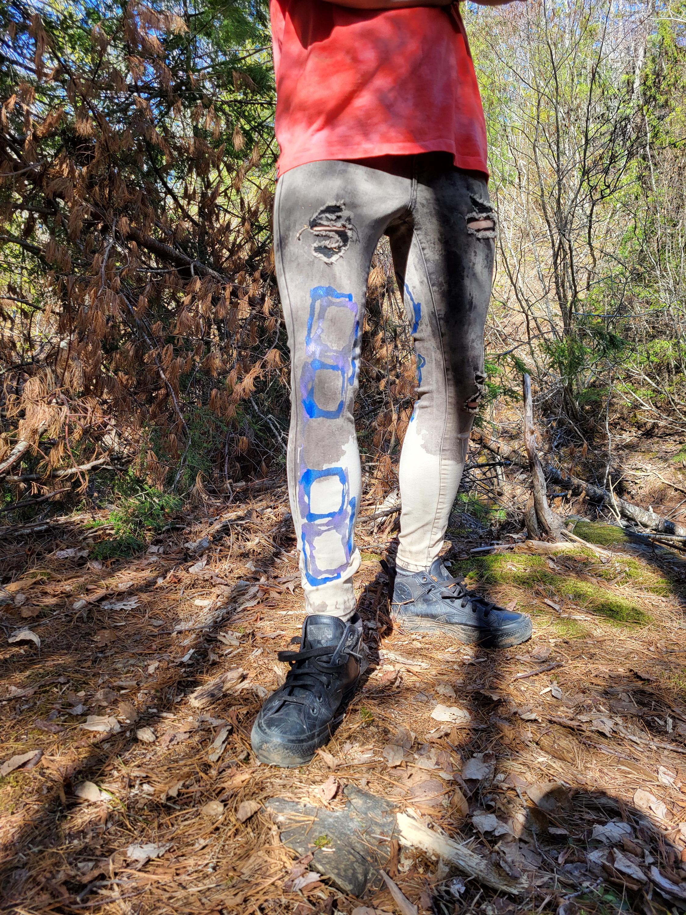 Acid washed black pants with purple and blue hand painted graphic