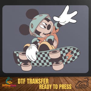 May include: DTF transfer featuring Mickey Mouse skateboarding. Mickey is wearing a helmet and orange shirt, riding a skateboard with a checkered pattern and lightning bolt. The background is a dark gray, with the text "DTF TRANSFER READY TO PRESS".