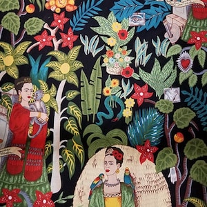 May include: A black fabric with a colorful pattern featuring two women with flowers, birds, and monkeys. The fabric has a vibrant, whimsical design with a Mexican folk art style.