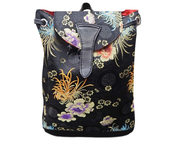 asian backpack leather flap Piel Large Buckle EX0001 on the occasion of the 30th anniversary in 2021 has encouraged Artisan + Artist to develop a new premium leather backpack made of Italian leather in a similar design language TUMI Wei Daxun Asia-Pacific Ambassador