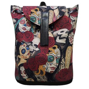 May include: A backpack featuring a Day of the Dead design. The bag is covered in images of sugar skulls, red roses, and other decorative elements. The bag has a black leather flap and a drawstring closure.