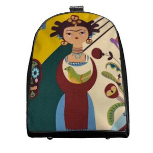May include: A backpack featuring a colorful illustration of a woman with a bird, flowers, and a skull. The design includes yellow, green, red, and blue elements, set against a cream background. The backpack has a black frame.