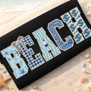 May include: A white ceramic mug with a black handle and the text "But First, Coffee" in a bold, black font. The mug is set against a blurred background, suggesting a cozy setting.