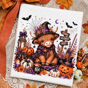 May include: A rectangular print featuring a fluffy brown highland cow wearing a witch hat and purple plaid cape. The scene includes pumpkins, a lantern, bats, spiderwebs, and a sign that reads Happy Halloween BOO! with a mug labelled BOO.
