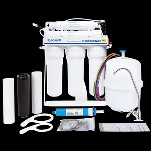 May include: A white water filtration system with four filters, a blue filter, a black filter, a white filter, and a white tank with a silver faucet. The system is labeled "STANDARD PRO" and "REVERSE OSMOSIS FILTER".