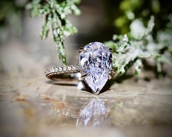 Pear Cut Cubic Zirconia Ring: Rhodium Plated Sterling Silver Statement