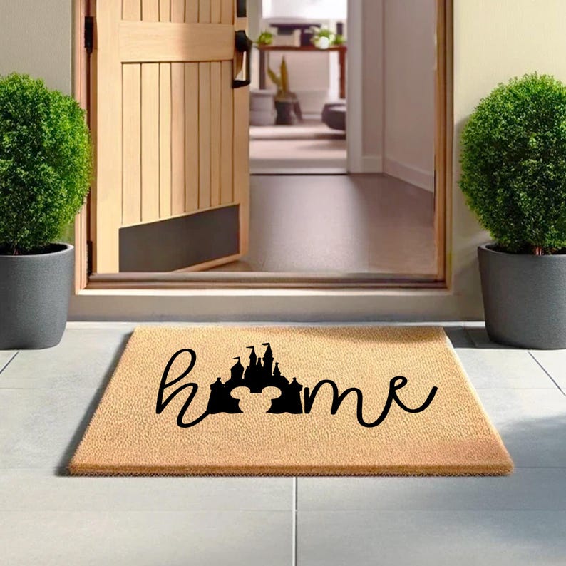 a welcome mat with a castle on it