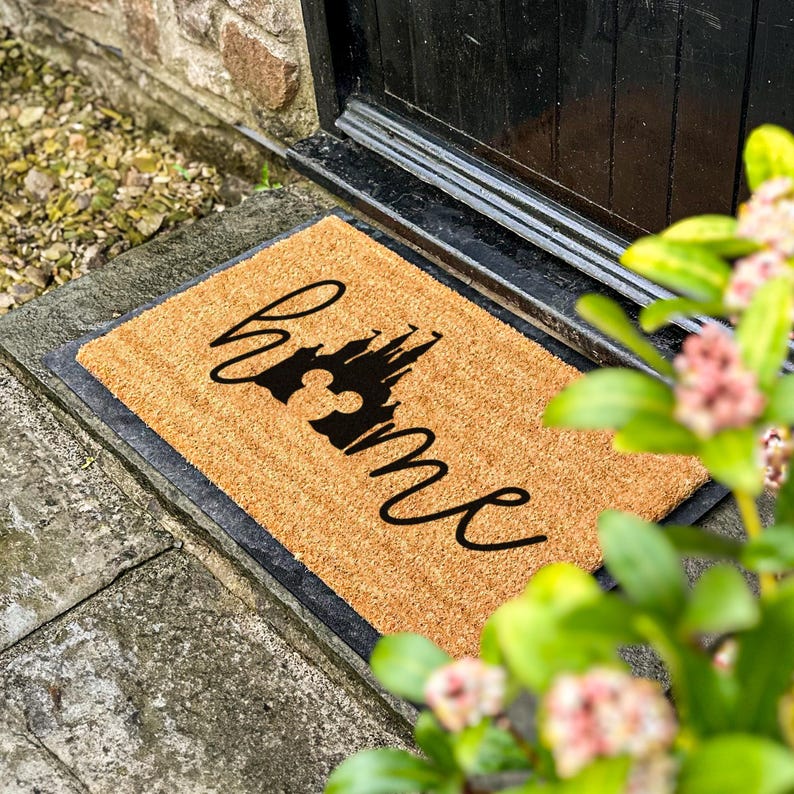 a door mat that says welcome on it