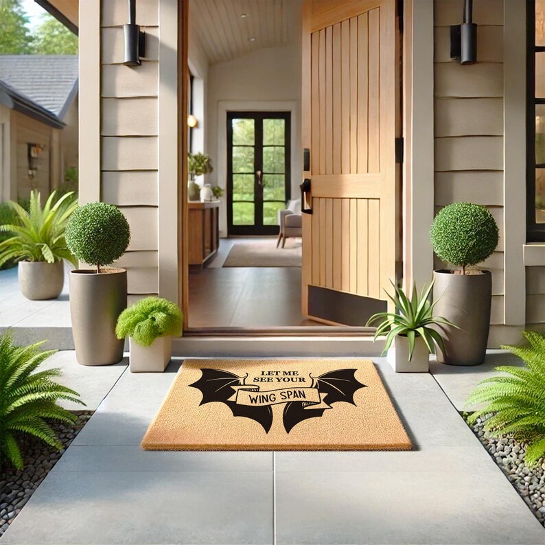 a welcome mat on the front of a house