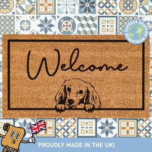 a welcome mat with a dog on it