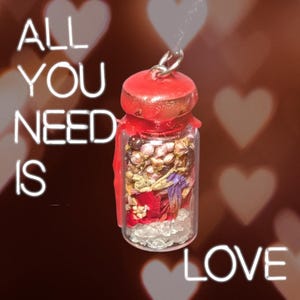 Love Spell Bottle Necklace, hand crafted, empowered, charged for its intentions.