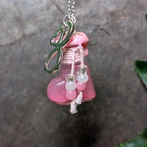 Love Potion Necklace. Bottle and charm on necklace chain