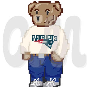 May include: A pixel art image of a brown bear wearing a white Patriots sweatshirt, blue jeans, and white trainers. The sweatshirt displays the Patriots logo in red, white, and blue. The bear is set against a white backdrop.