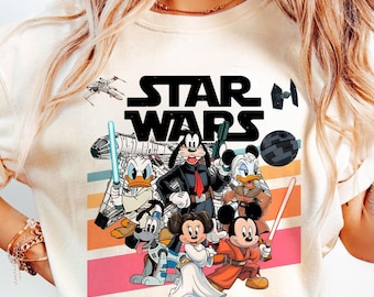 Maglietta di Topolino e i suoi amici di Star Wars, maglietta Disney di Topolino e Han Solo, magliette di Goofy Stormtrooper, maglietta di Paperino Jedi, magliette di Galaxy's Edge