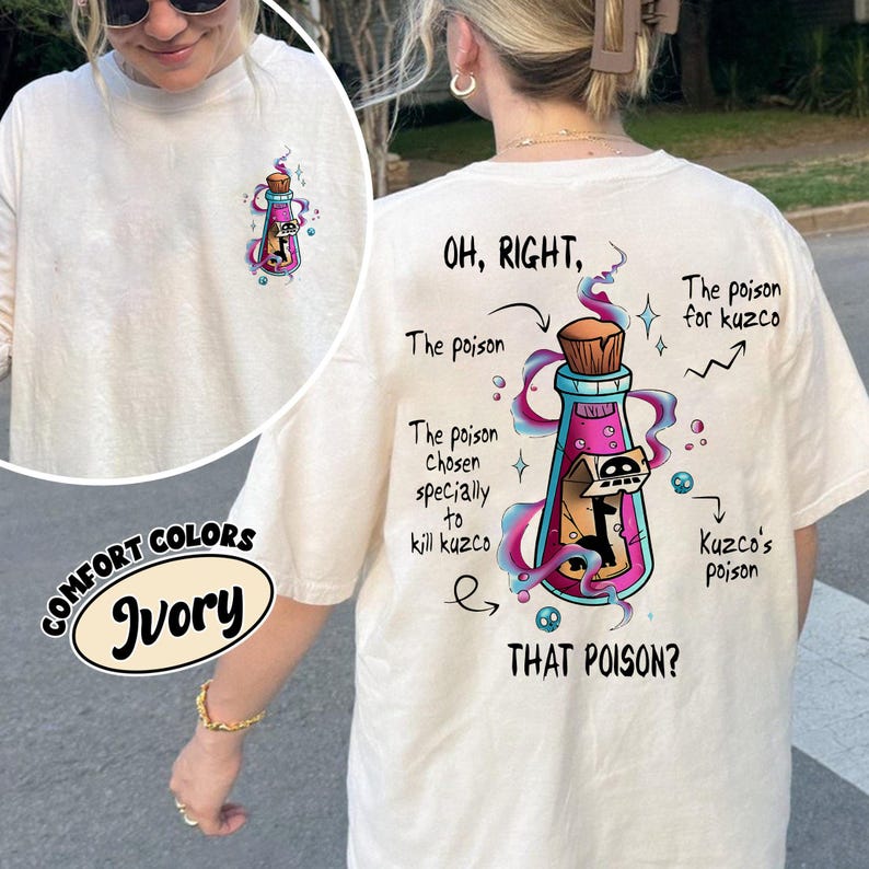 May include: Ivory-colored t-shirt with a graphic of a potion bottle and the text "OH, RIGHT, THAT POISON?" The bottle is pink and blue with a brown cork and contains a black figure. The shirt also has the text "The poison chosen specially to kill kuzco."