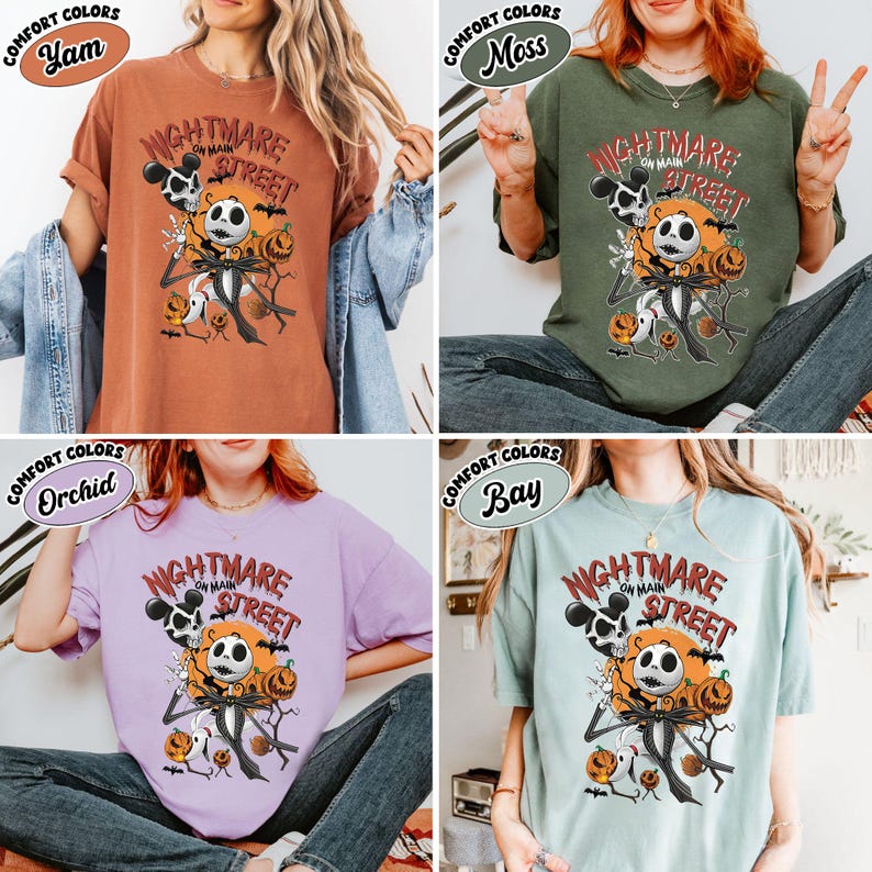 May include: Four t-shirts in different colors: yam, moss, orchid, and bay. Each shirt features a graphic of Jack Skellington from The Nightmare Before Christmas, with the text "Nightmare on Main Street".