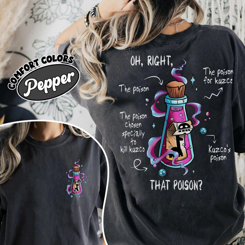 May include: Dark grey t-shirt with a colorful graphic of a potion bottle and the text "OH, RIGHT, THAT POISON?" The design includes the text "The poison chosen specially to kill kuzco" and "Kuzco's poison".