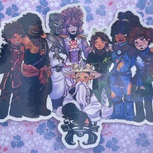 May include: A sticker featuring a group of stylized characters in various outfits. The characters are diverse, with varying skin tones and hairstyles. The sticker has a white border and is set against a floral background.