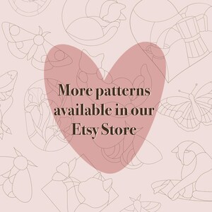 May include: A pink heart with the text "More patterns available in our Etsy Store" on a light pink background with various line drawings of butterflies, cats, and other designs.