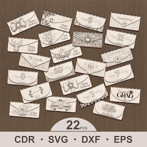 May include: A collection of 22 laser-cut wooden greeting card holders with various designs and text, including "Happy Birthday," "Congratulations," and "Best Wishes." The cards feature decorative elements like bows, flowers, and illustrations.