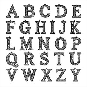 May include: A collection of twenty-six black letter pendants, each featuring an intricate, filigree-style cutout pattern. Every letter of the alphabet is represented in a bold, serif font, and each piece includes a small loop at the top for hanging.