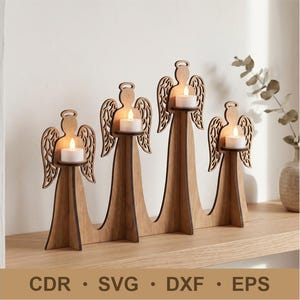 May include: A wooden candle holder featuring four angel-shaped silhouettes of varying heights, each with intricate cut-out wing details and a small circular platform holding a white tea light candle. The text CDR, SVG, DXF, EPS is visible.
