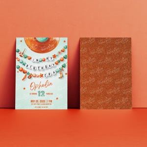 May include: A birthday invitation with a turquoise background and a decorative garland. The invitation reads "In My Birthday Era" and features the name "Ophelia" and the age "12". The date and time are also included.