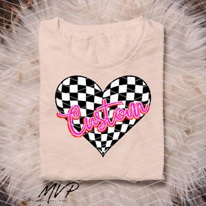 May include: A pink and white chequered heart with the word "Custom" in pink neon lettering. The heart is on a light pink t-shirt.