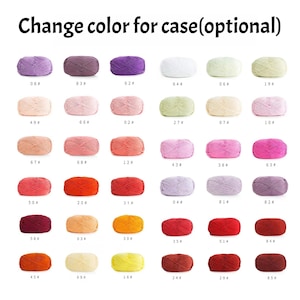 May include: A selection of yarn balls in various colors, including purple, pink, red, orange, yellow, green, blue, and brown. Each ball is labeled with a number.