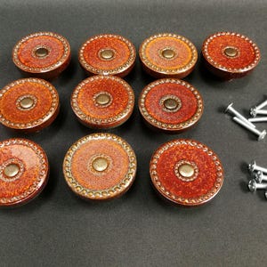 10 pcs. Really fancy door handles, furniture knobs, brown glazed stoneware made by the legend Carl-Harry Stålhane! Swedish made. 1960s.