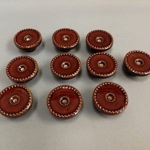 10 pcs. Really fancy door handles, furniture knobs, brown glazed stoneware made by the legend Carl-Harry Stålhane! Swedish made. 1960s.