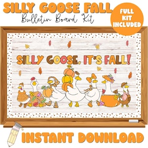 May include: A bulletin board kit featuring a white wood-grain background with the text SILLY GOOSE, IT'S FALL! and illustrations of six geese wearing autumn-themed clothing and accessories, surrounded by orange, yellow, and red falling leaves.