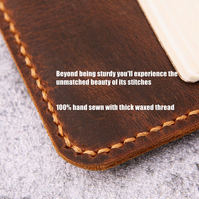 May include: Close-up of a brown leather item with visible stitching. The text reads "Beyond being sturdy you'll experience the unmatched beauty of its stitches" and "100% hand sewn with thick waxed thread."