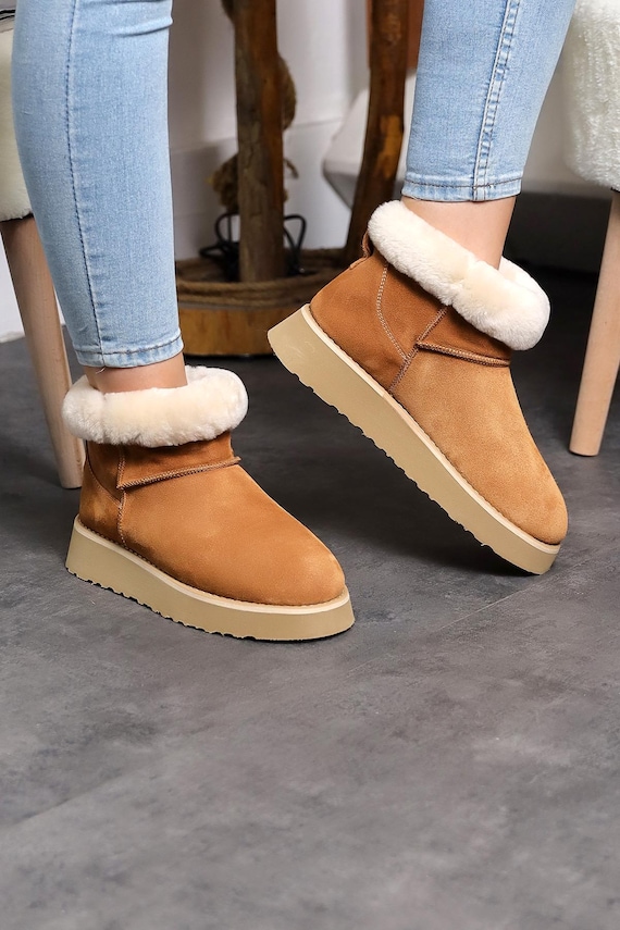 Stivali in pelle scamosciata fatti a mano e foderati in pelliccia