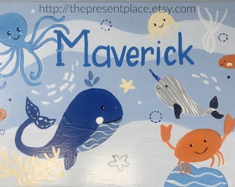 personalized stepstool with a blue whale and a friendly orange crab