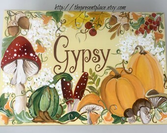 personalized step stool with mushrooms and pumpkins in fall colors