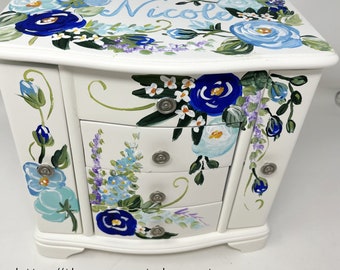 large personalized white jewelry box with hanging space and blue roses