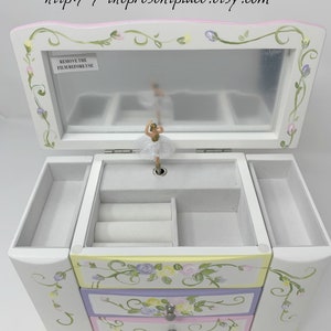 personalized musical jewelry box with a ballerina and space for hanging jewelry