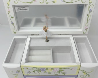 personalized musical jewelry box with a ballerina and space for hanging jewelry