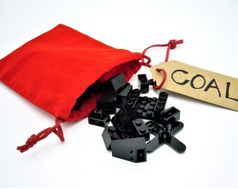 Christmas Coal Velvet Bag full of Black toy bricks by AbbieDabbles