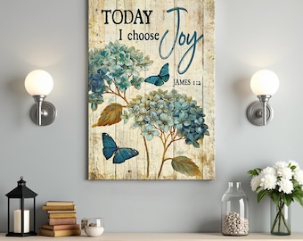 Puede incluir: Un fondo de madera con un diseño floral azul y blanco y mariposas azules. El texto "TODAY I choose Joy" está escrito en negro con la referencia bíblica "JAMES 1:12" debajo.