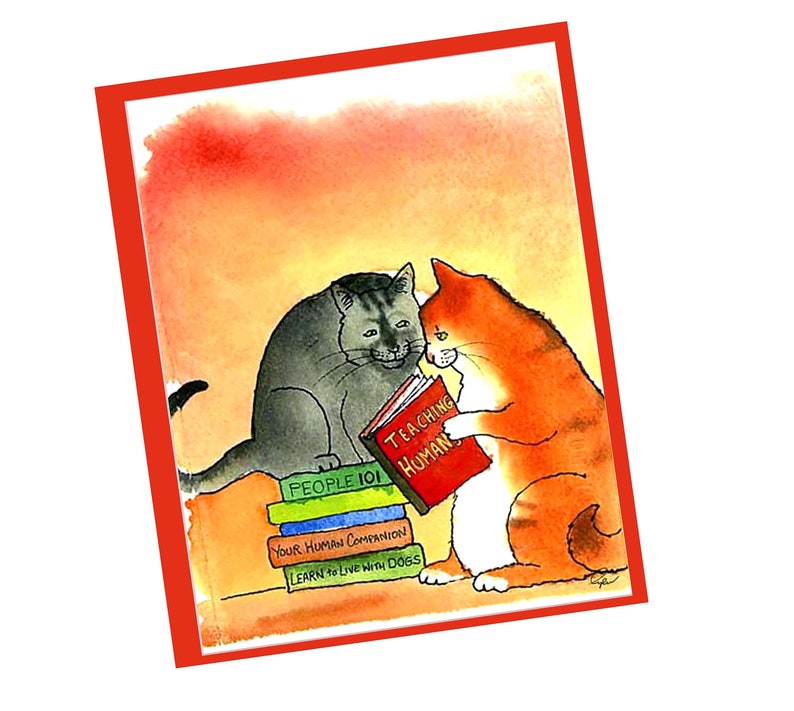 May include: Watercolor illustration of two cats reading. One gray cat sits beside an orange cat holding a red book titled "TEACHING HUMANS." Other books are stacked below, including "PEOPLE 101." The artwork is framed in red.